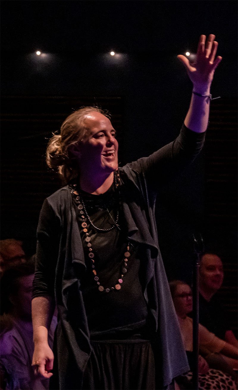 Signe Sørensen - On stage leading Mariager Fjord Girls Choir